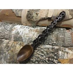 Carved, interior spoon-amulet made of wood